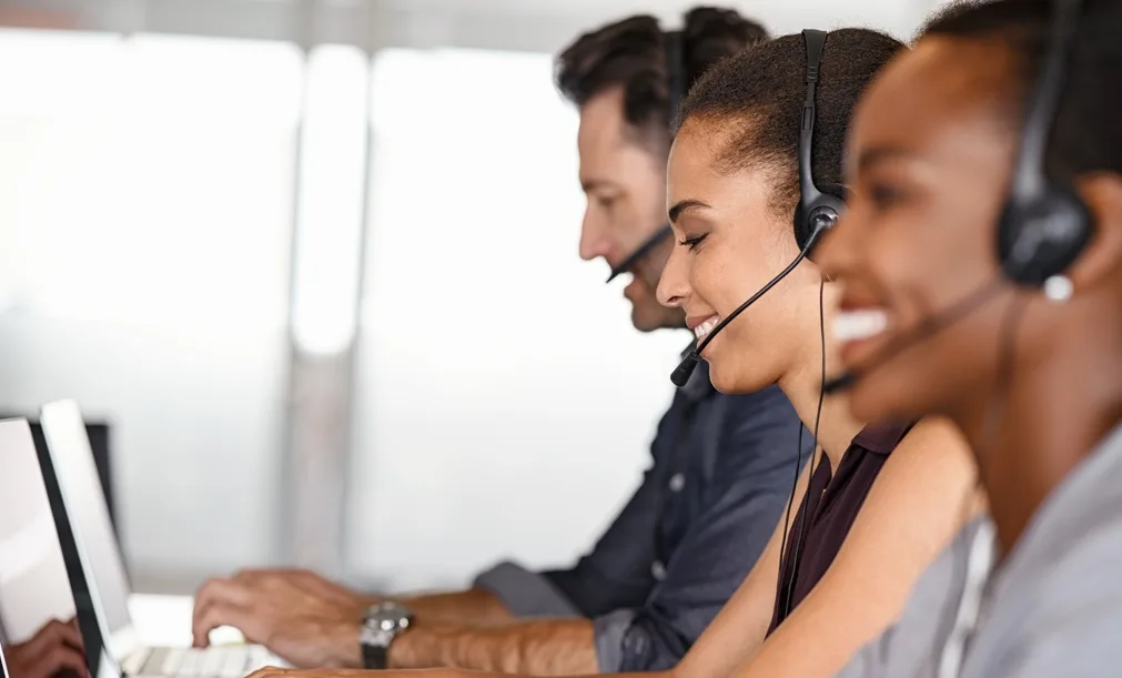 Customer service representative helping a caller