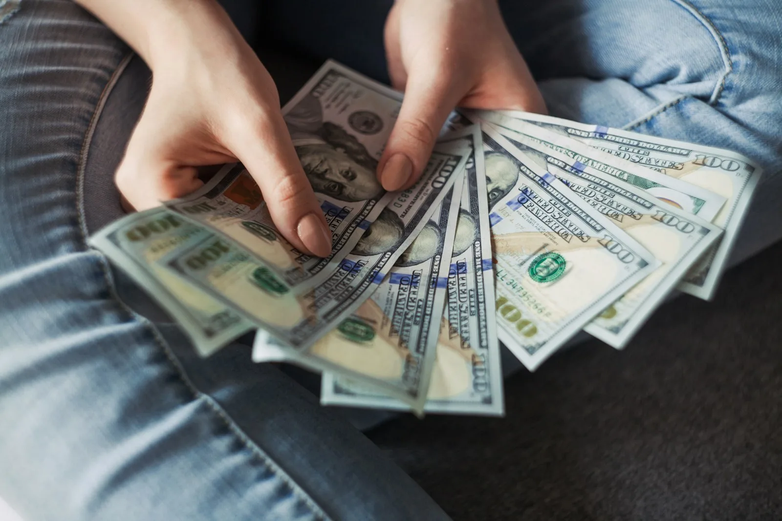 Cash and coins illustrating money ready to invest in index funds