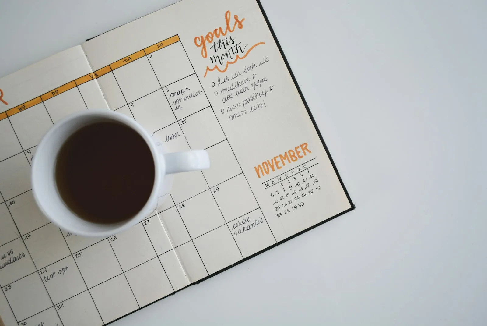 Wall calendar and planning tools used to track bill due dates
