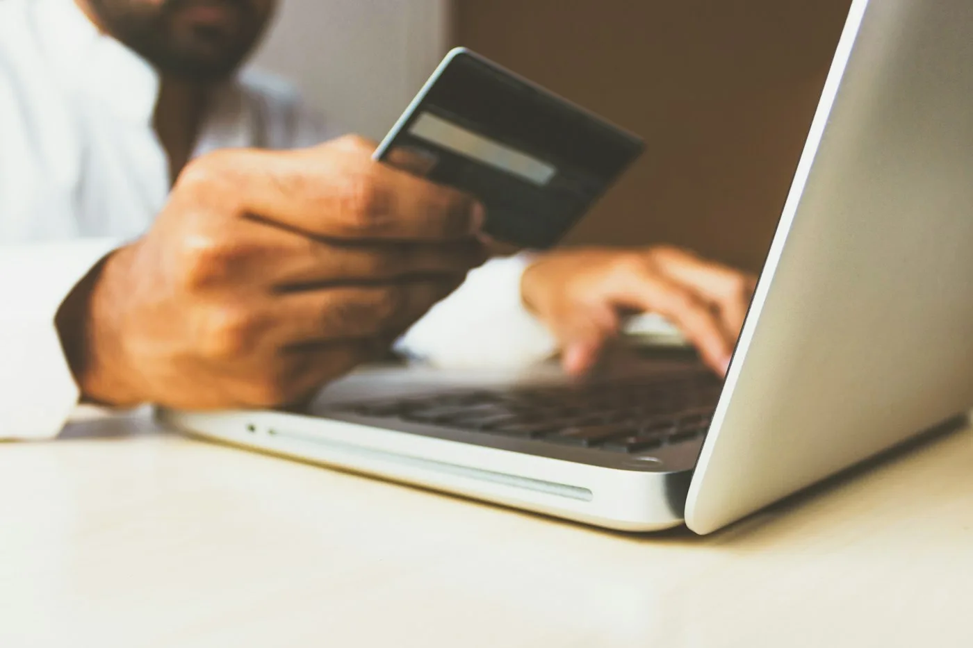 Close-up of a credit card representing high-APR debt to attack first